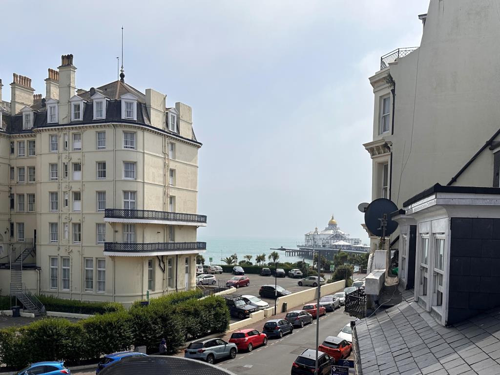Lot: 54 - SUBSTANTIAL BLOCK OF 20 FLATS FOR IMMEDIATE INVESTMENT - View of seafront and Eastbourne from balcony